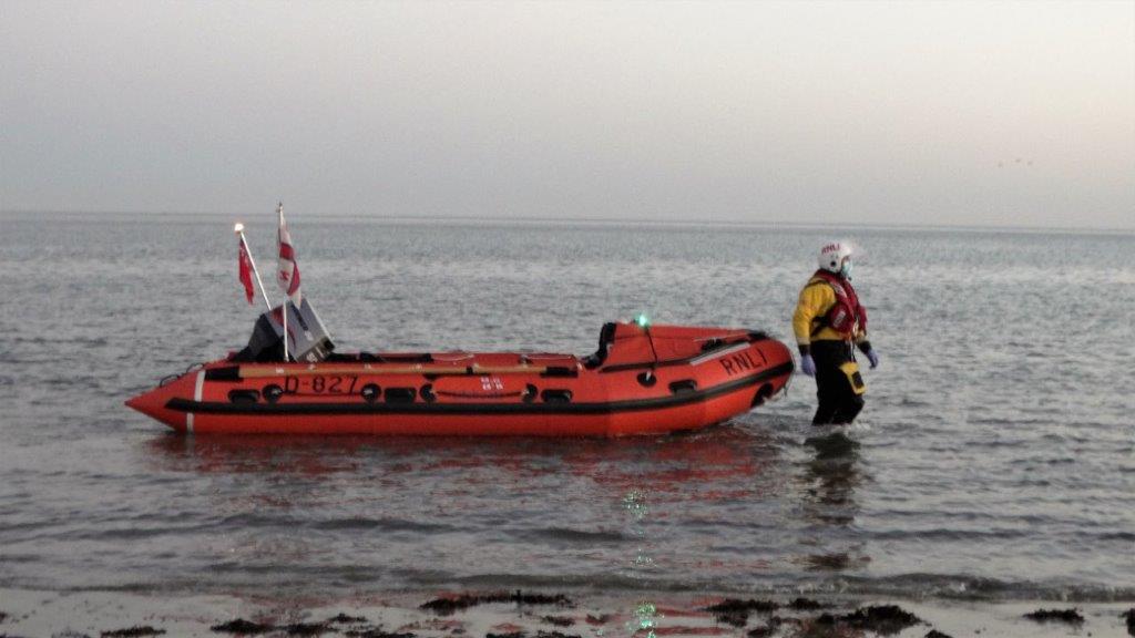 Persons cut off by tide